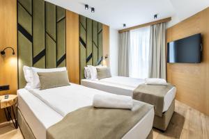 NATURA All Seasons Boutique Hotel